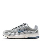 Men's Air Jordan P-6000 sneakers in Light Smoke Grey, featuring stylish athletic footwear with grey and white accents.