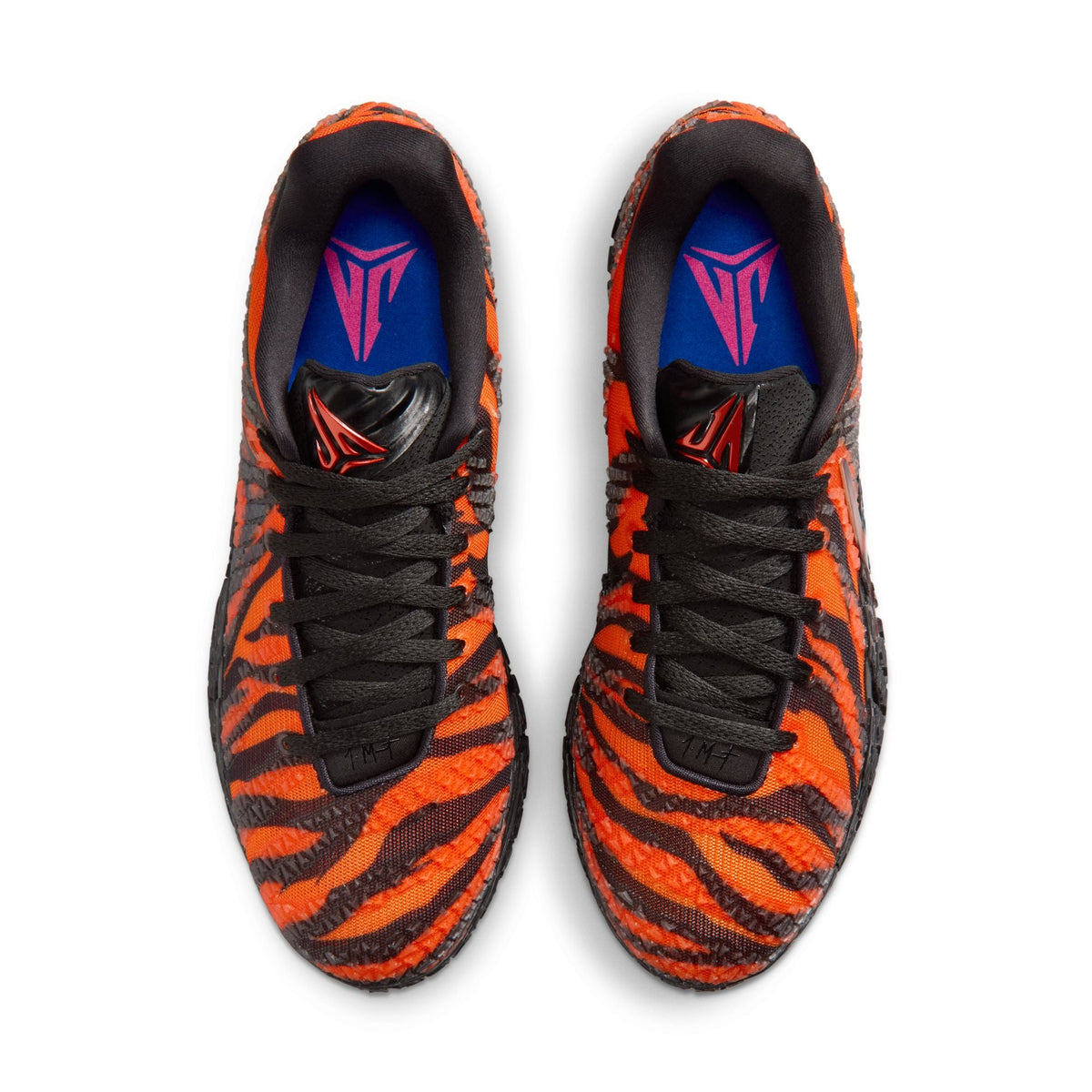 Nike men's Ja 3 Animal Pack tiger-themed footwear with bold tiger print design in a sleek athletic style.