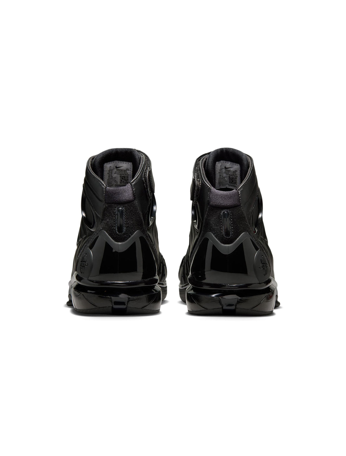 Black Nike Air Zoom Huarache 2K4 OT men's footwear with sleek design and athletic style, shown from side view.