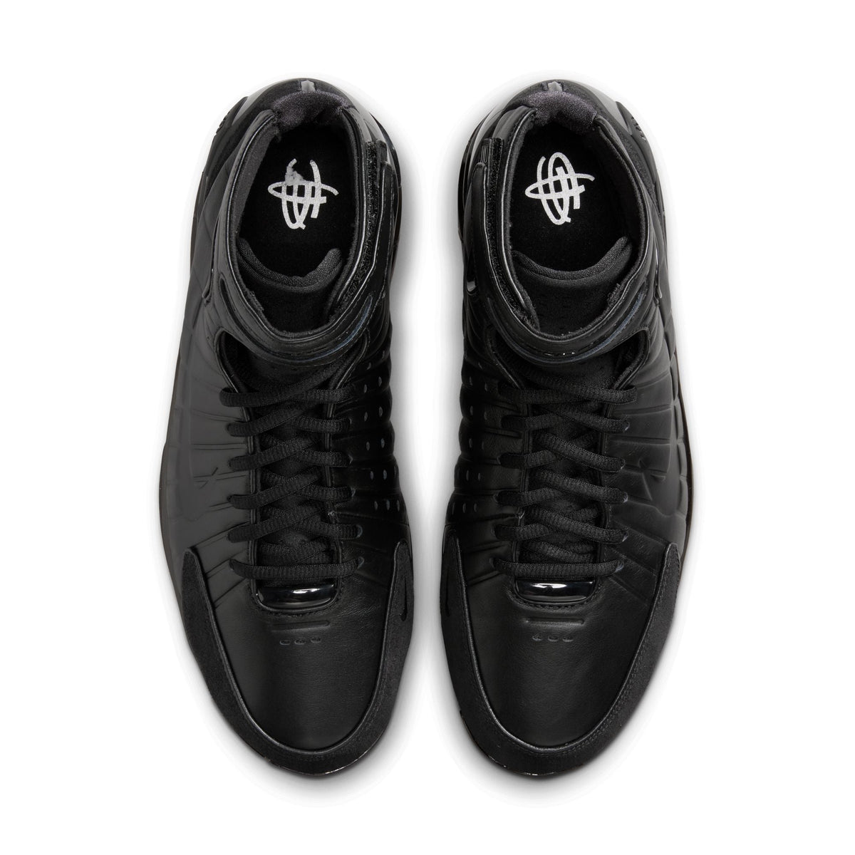 Black Nike Mens Air Zoom Huarache 2K4 OT basketball shoes with sleek design and supportive cushioning.