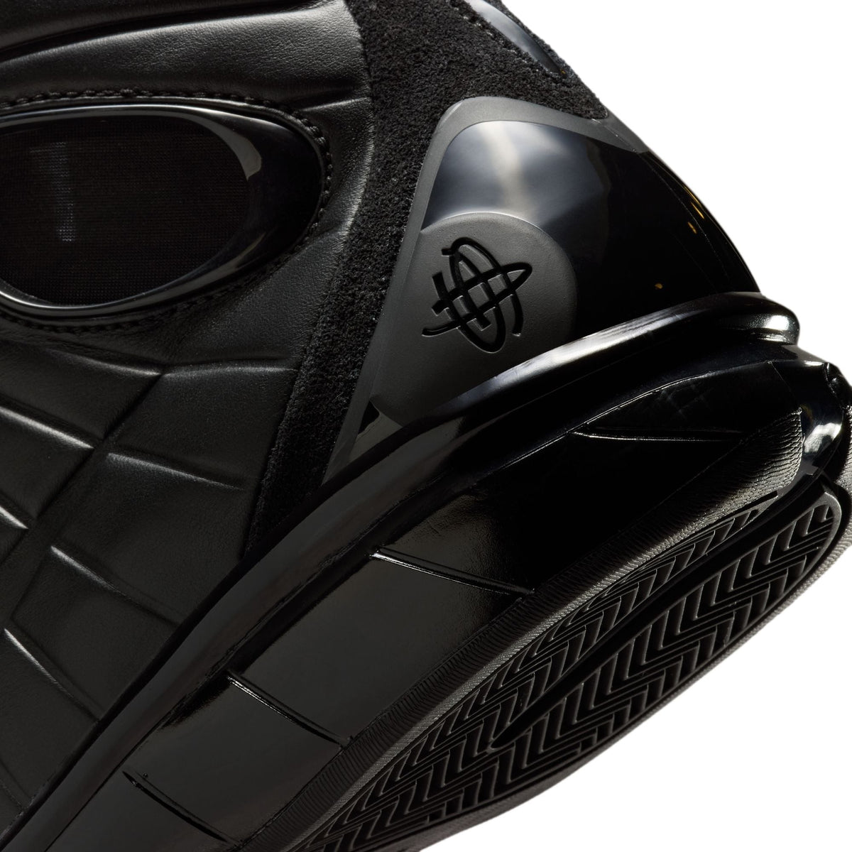 Black Nike Mens Air Zoom Huarache 2K4 OT basketball shoes with sleek design and athletic style.