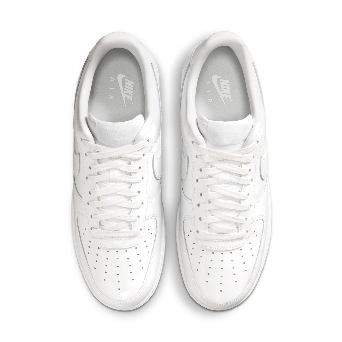 Nike Men's Air Force 1 '07 Premium White sneakers by Denim Exchange, side view, leather upper and rubber sole