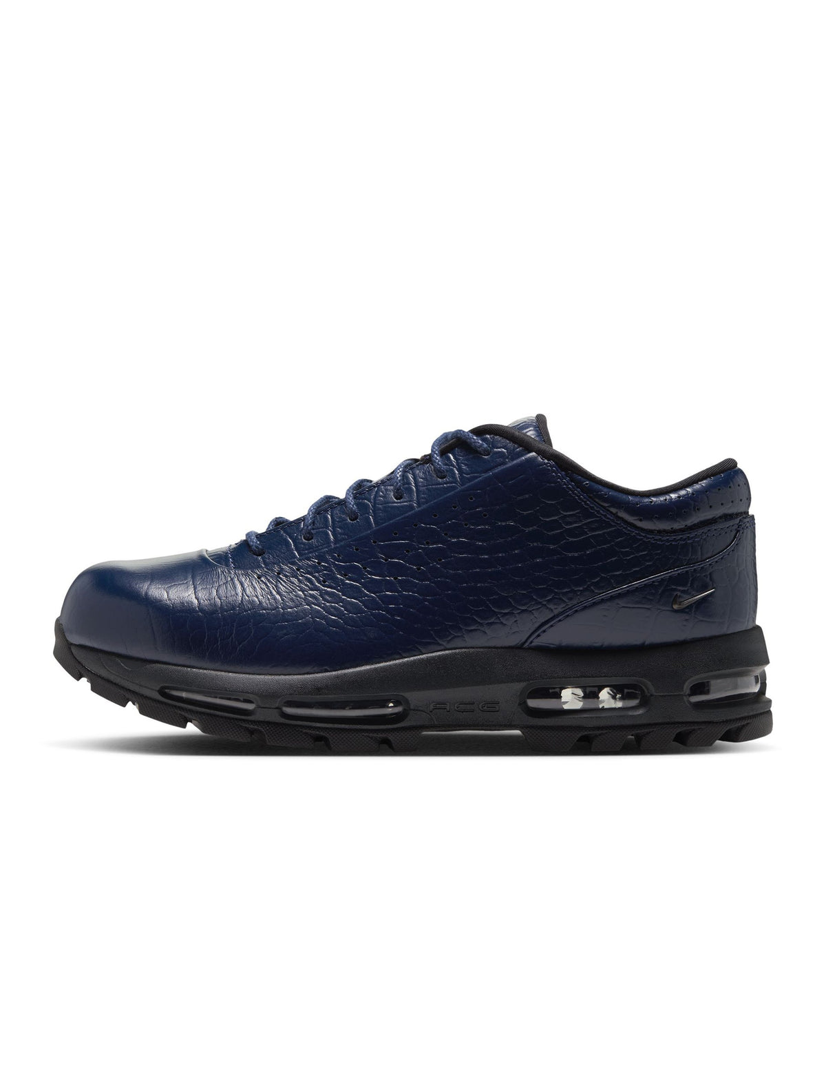 Nike men's Air Max Goadome Low Croc Skin footwear in midnight navy, featuring textured croc pattern and athletic design.