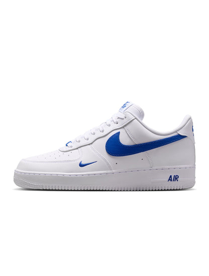 Nike men's Air Force 1 '07 sneakers in white and game royal, showcasing the classic design and color contrast of these footwear shoes.