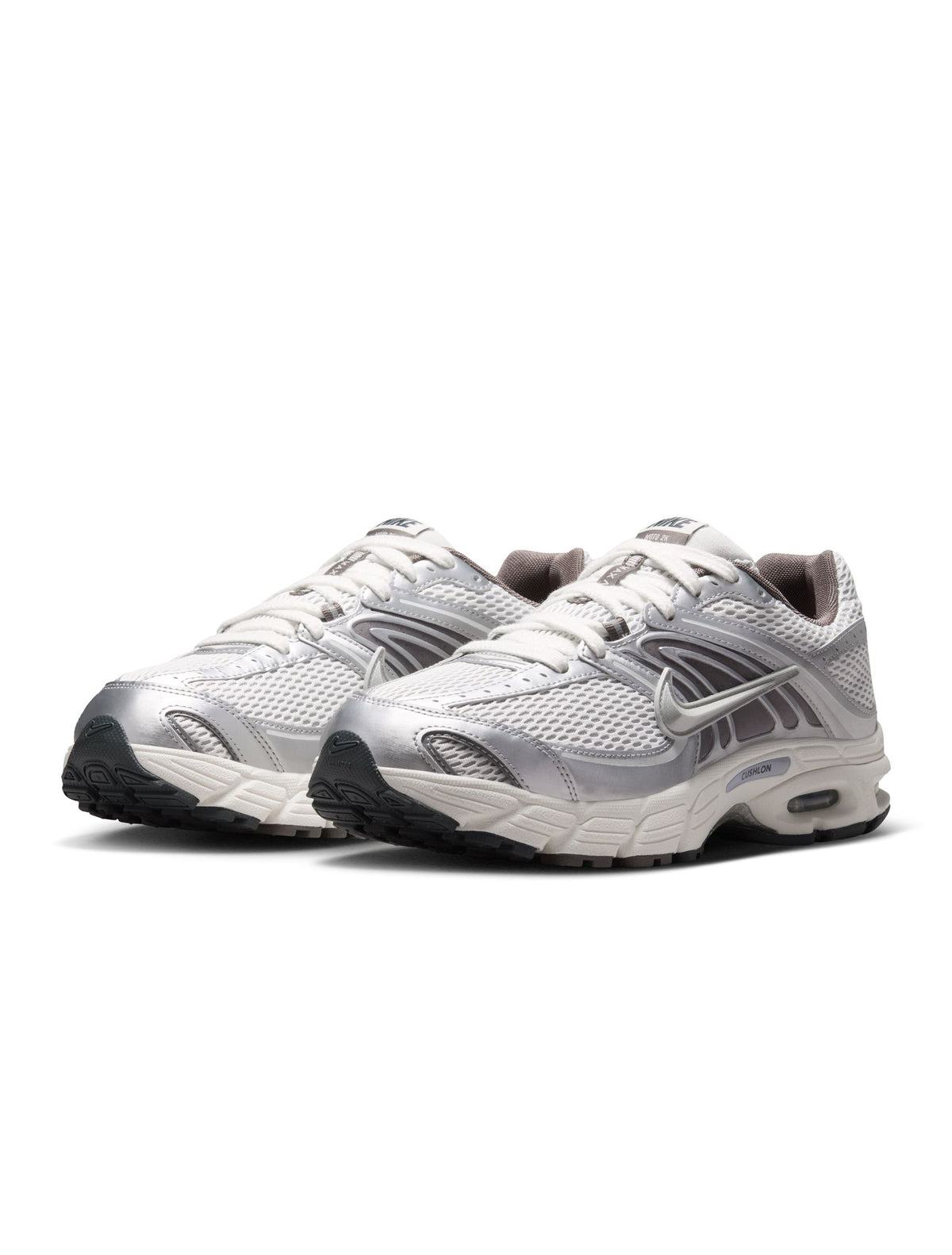 Nike Men's Air Max Moto 2K sneakers in platinum tint, featuring a sleek design and cushioned sole for comfortable everyday wear.