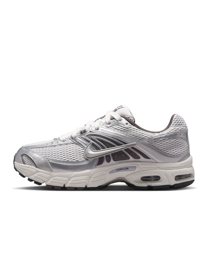 Nike men's Air Max Moto 2K sneakers in platinum tint, showcasing sleek design and breathable mesh upper.