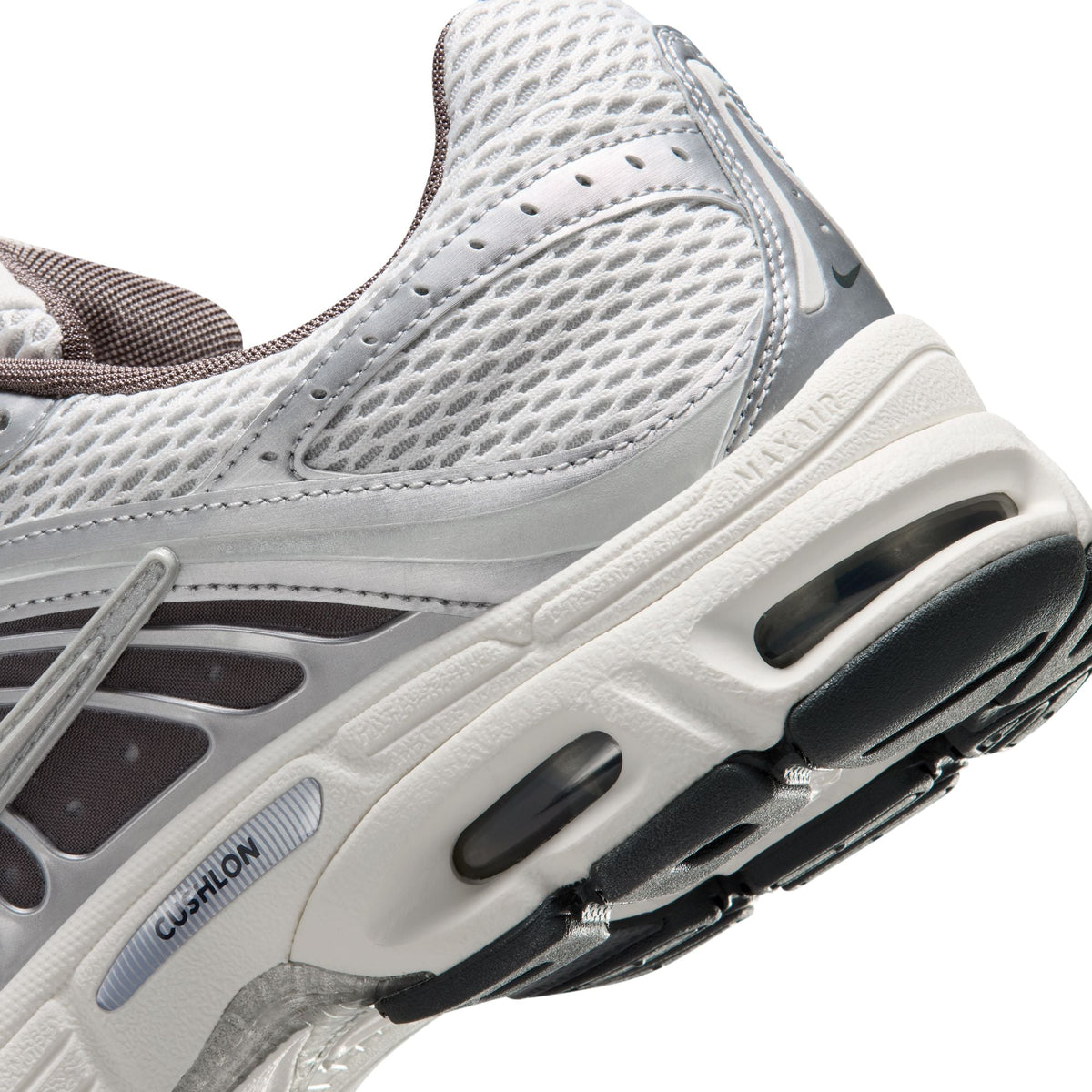 Nike Men's Air Max Moto 2K sneakers in platinum tint, athletic footwear with sleek design and visible Air Max cushioning.
