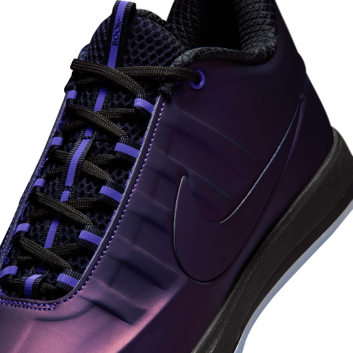Nike Men's Book 2 Premium Eggplant Foamposite sneakers in purple with black accents, displayed on a plain background.