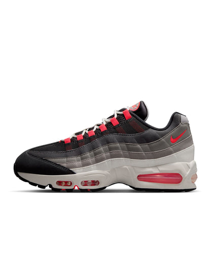 Nike Mens Air Max 95 Big Bubble Premium sneakers in Solar Red, featuring vibrant red color and stylish design.