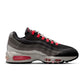 Nike Men's Air Max 95 Big Bubble Premium sneakers in Solar Red, featuring vibrant color and classic athletic design.