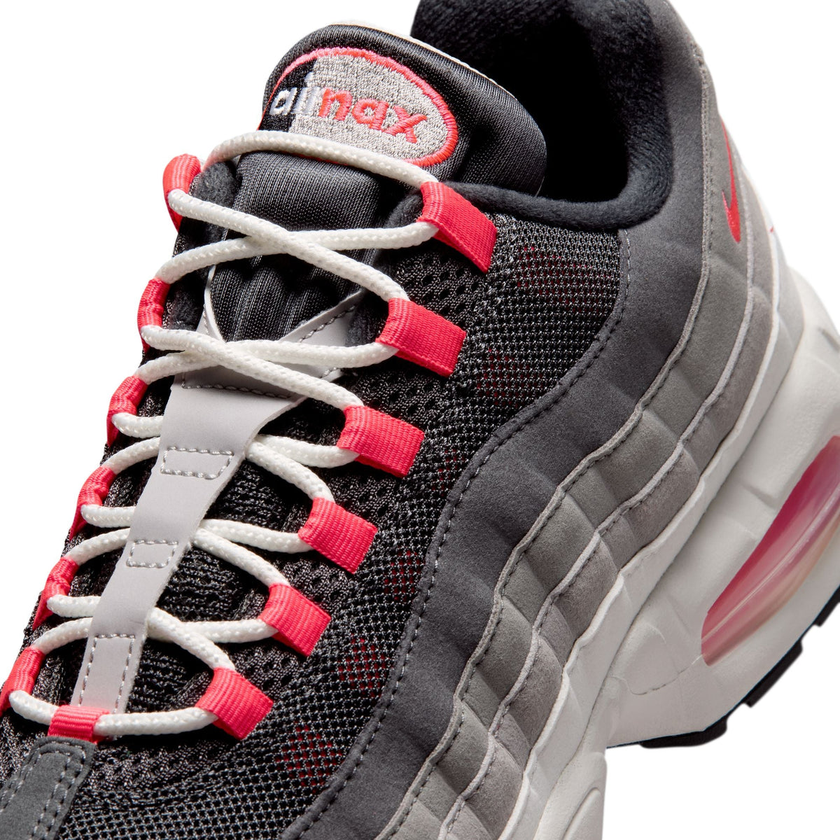 Nike Mens Air Max 95 Big Bubble Premium sneakers in Solar Red, featuring sleek design and visible Air Max cushioning.