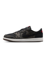 Men's Air Jordan 1 Low OG Laser sneakers in black and red, featuring sleek leather design and iconic branding.