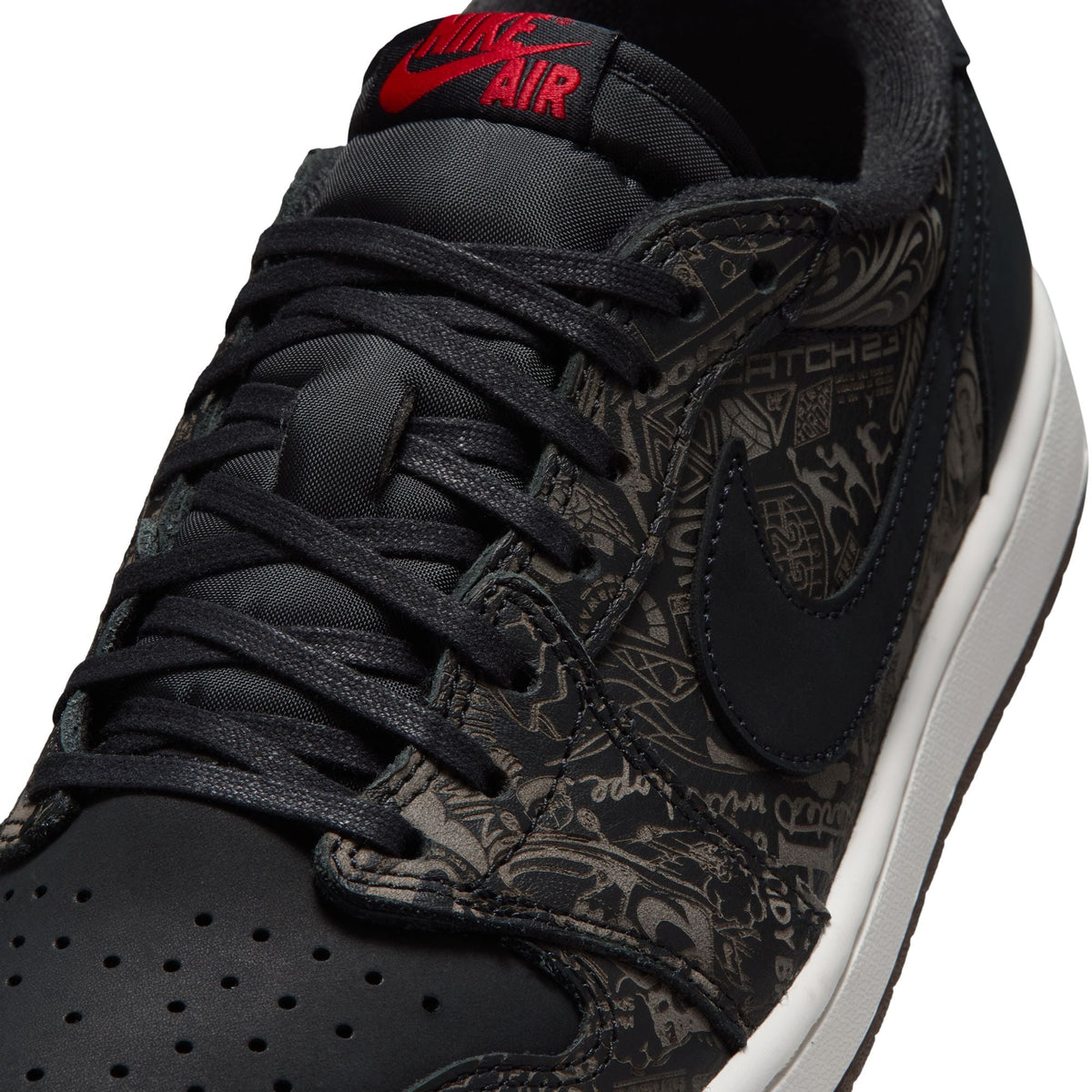 Men's Air Jordan 1 Low OG Laser sneakers in black and red with white accents, casual footwear by Denim Exchange.