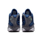 Men's Air Jordan 13 Retro Flint sneakers in blue and gray leather, showcasing the iconic design and reflective accents.