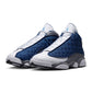 Men's Air Jordan 13 Retro Flint sneakers in blue and grey leather and suede with signature design details.