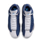 Men's Air Jordan 13 Retro Flint sneakers in blue and grey with leather and suede details, on a white background.
