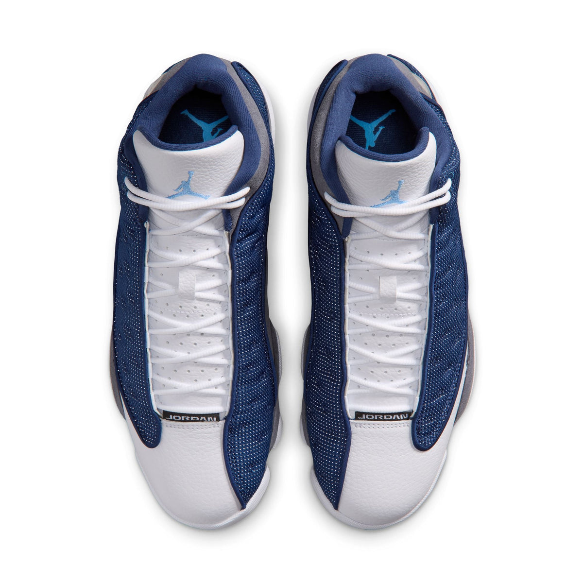 Men's Air Jordan 13 Retro Flint sneakers in blue and grey with leather and suede details, on a white background.