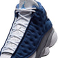 Men's Air Jordan 13 Retro Flint sneakers in navy and grey, featuring signature design details and a sleek basketball shoe profile.
