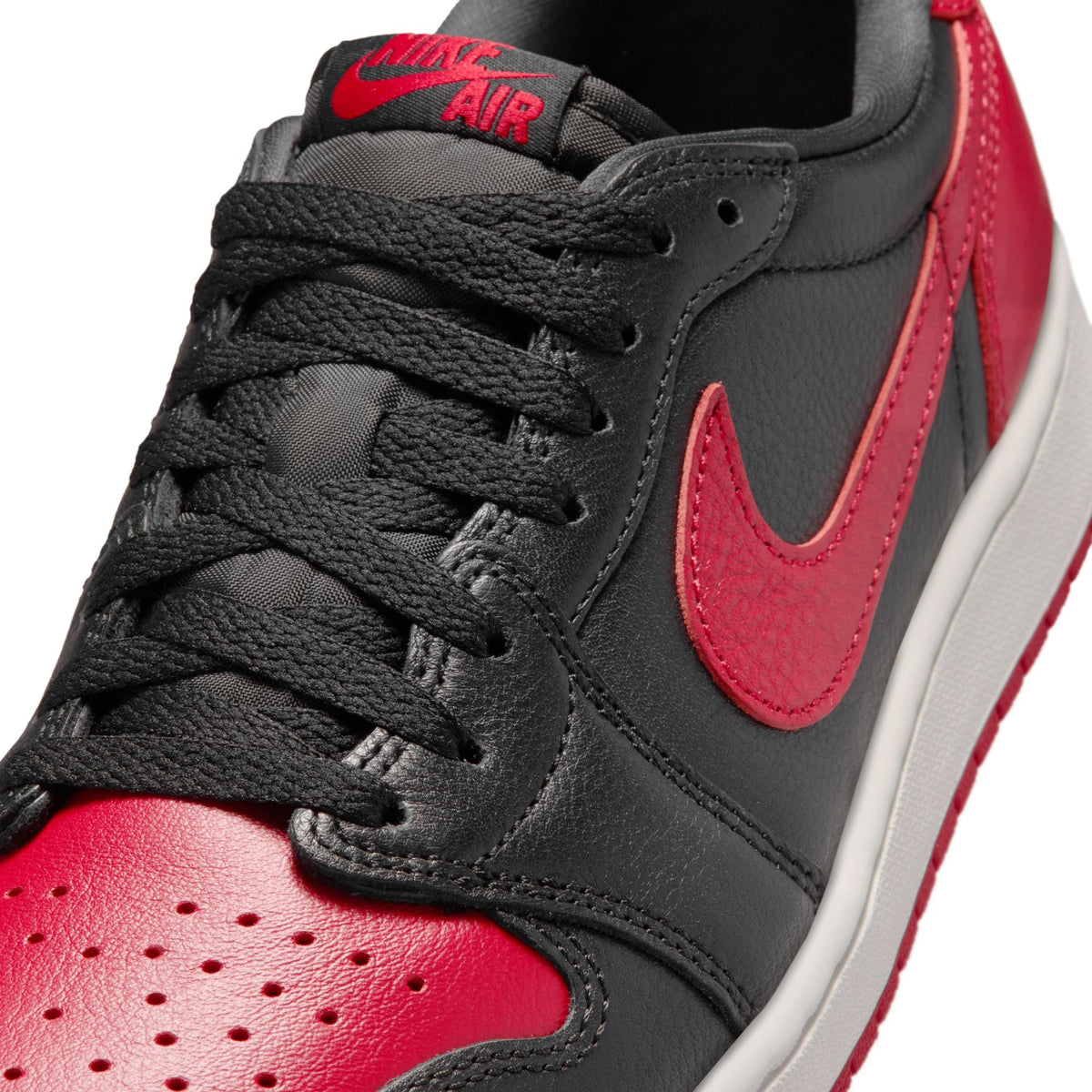 Air Jordan 1 Retro Low OG Banned men's footwear by Denim Exchange, black low-top sneaker side view