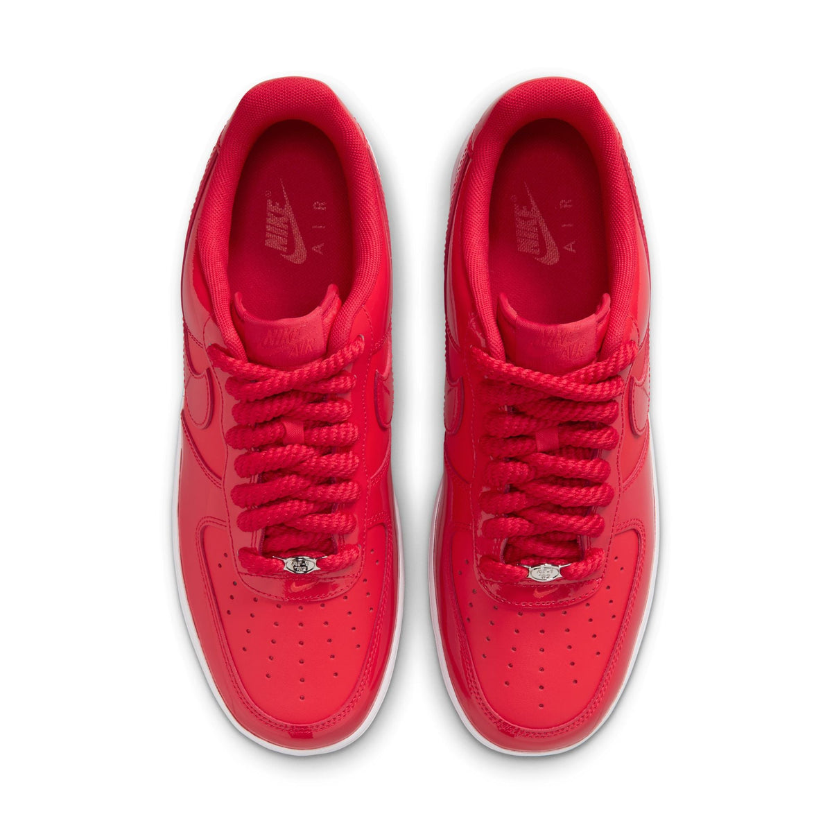 Men's Nike Air Force 1 '07 LV8 Patent sneakers in University Red, featuring shiny patent leather and classic design.