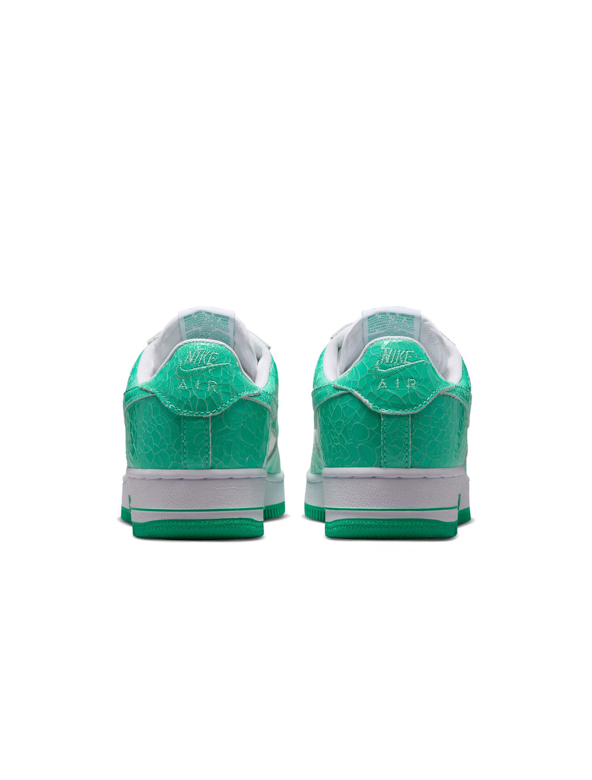 Nike Mens Air Force 1 Menta sneakers in white with mint green accents, showcased on a plain background.