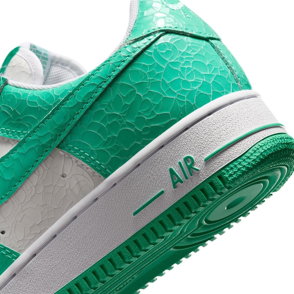 Nike men's Air Force 1 Menta sneakers in white and mint green, showcasing the stylish footwear design.
