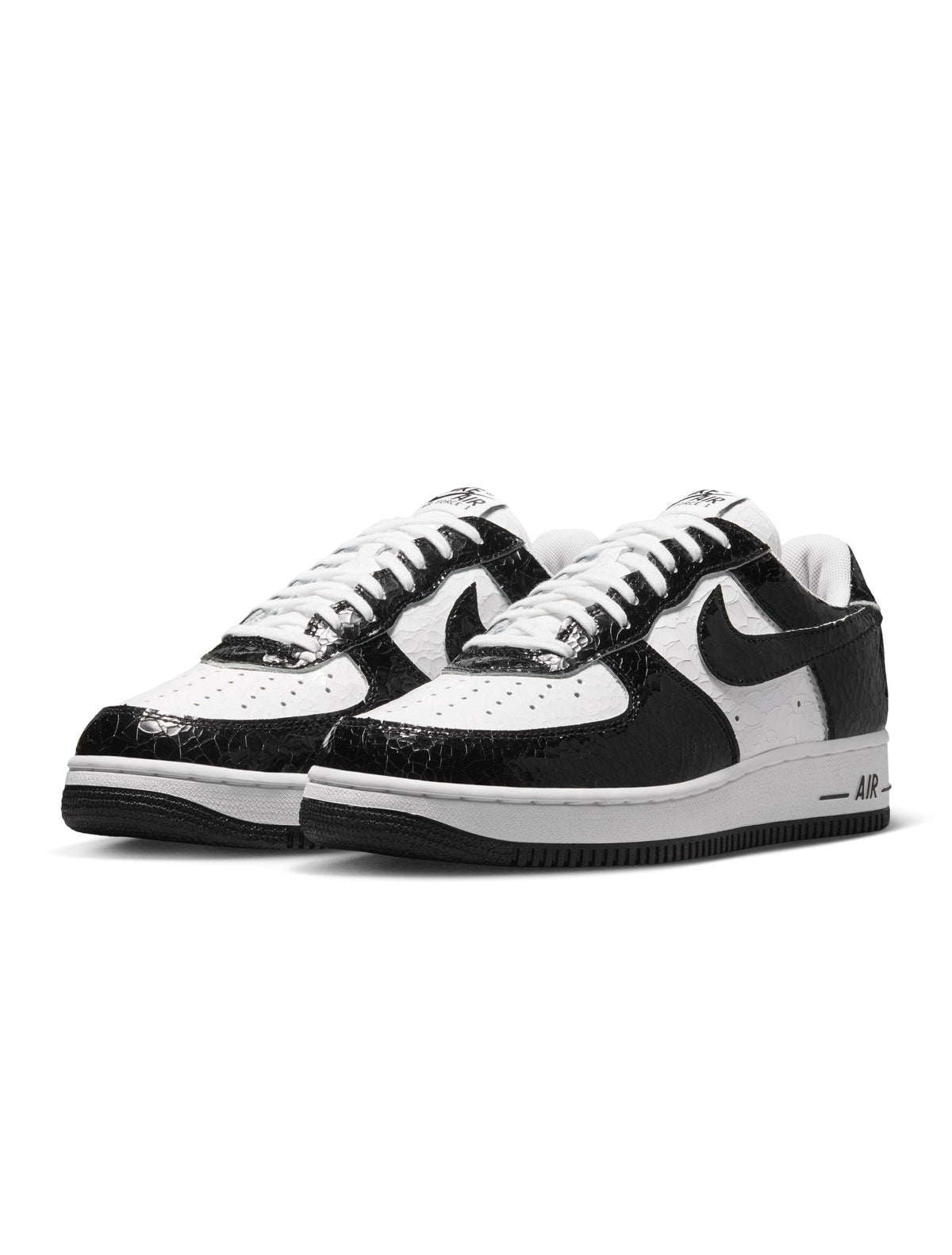 Men's Nike Air Force 1 cracked leather sneakers in white and green, side view