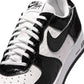 Nike men's Air Force 1 cracked leather sneakers in white with textured leather upper.