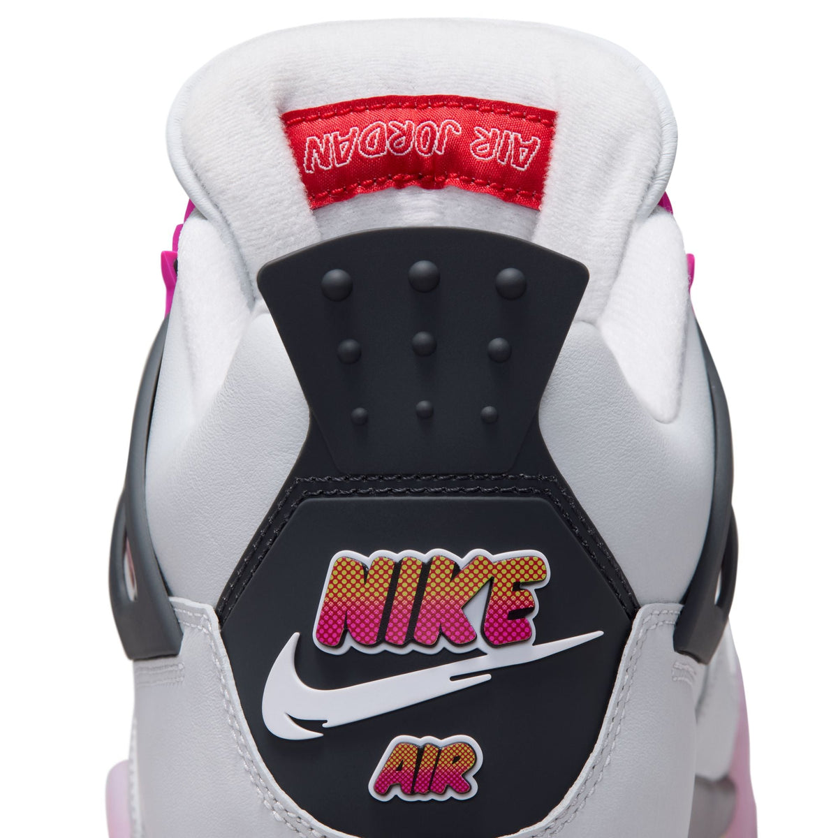 Men's Air Jordan 4 Retro Comic sneakers in black and white with red accents, showcasing iconic basketball shoe design.