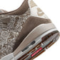 Men's Air Jordan 3 Retro Laser sneakers in black and red with white accents, styled for casual wear.
