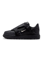 Nike Men's Air Force 1 Luxe black sneakers, stylish footwear with premium design, shown in a close-up shot on a white background.