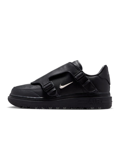 Nike Men's Air Force 1 Luxe black sneakers, stylish footwear with premium design, shown in a close-up shot on a white background.