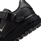 Black Nike Air Force 1 Luxe men's footwear with sleek design and premium details, displayed in a natural pose.