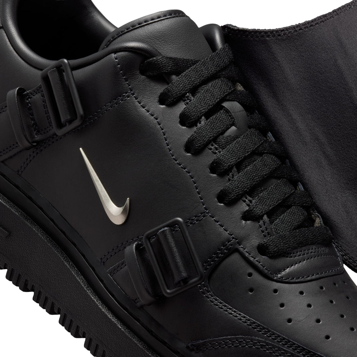 Black Nike Air Force 1 Luxe men's footwear with sleek design and premium details, showcased in a stylish side view.
