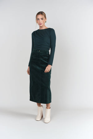Emerald Mickie Top by Adina Las Vegas featuring a stylish, fitted design with elegant detailing, perfect for casual or dressy wear.