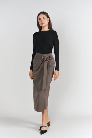 Mink-colored Rosette Midi Skirt by Adina Las Vegas featuring elegant floral detailing and a flowing, midi-length silhouette.