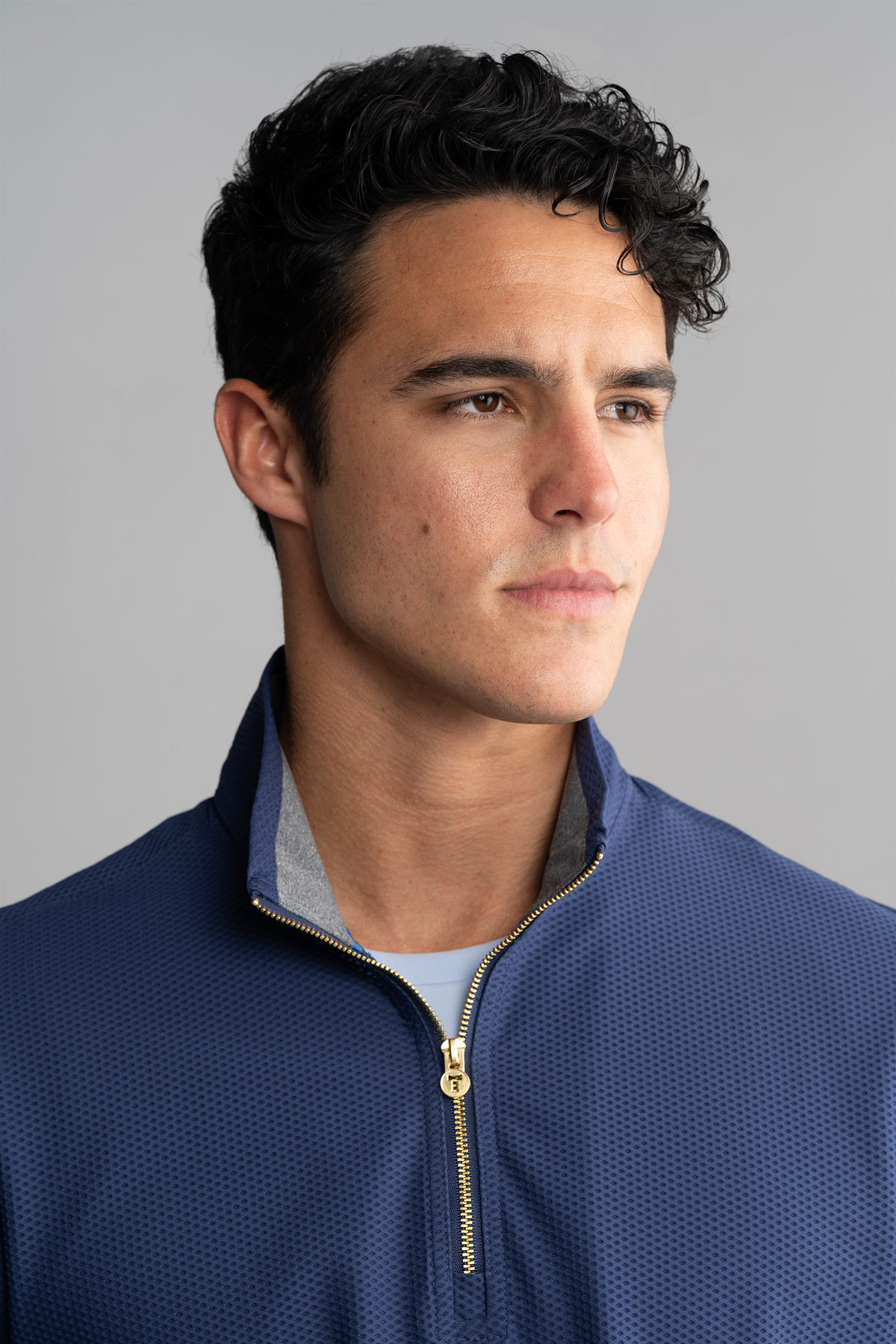 Blue Twillory Air Quarter Zip shirt, close-up of the collar and chest area, showcasing the lightweight fabric and sleek design.