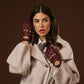 Oxblood Alessa classic Italian lambskin leather driving gloves with detailed stitching and a snug fit.