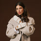 White Alessa Italian lambskin leather driving gloves with detailed stitching and a classic fit, designed for comfort and style.