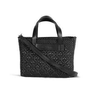 All black small woven crossbody bag by Tin Marin Brand, featuring a compact design with a woven texture and adjustable strap.