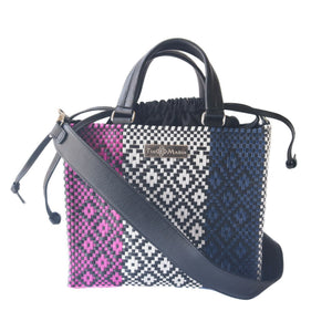 Bloom medium woven crossbody bag with drawstring closure, stylish and lightweight from Tin Marin Brand.
