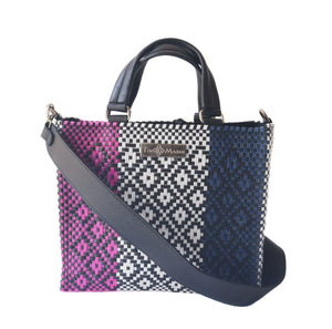 Bloom medium woven crossbody bag with drawstring closure by Tin Marin, featuring a stylish woven design and adjustable strap.