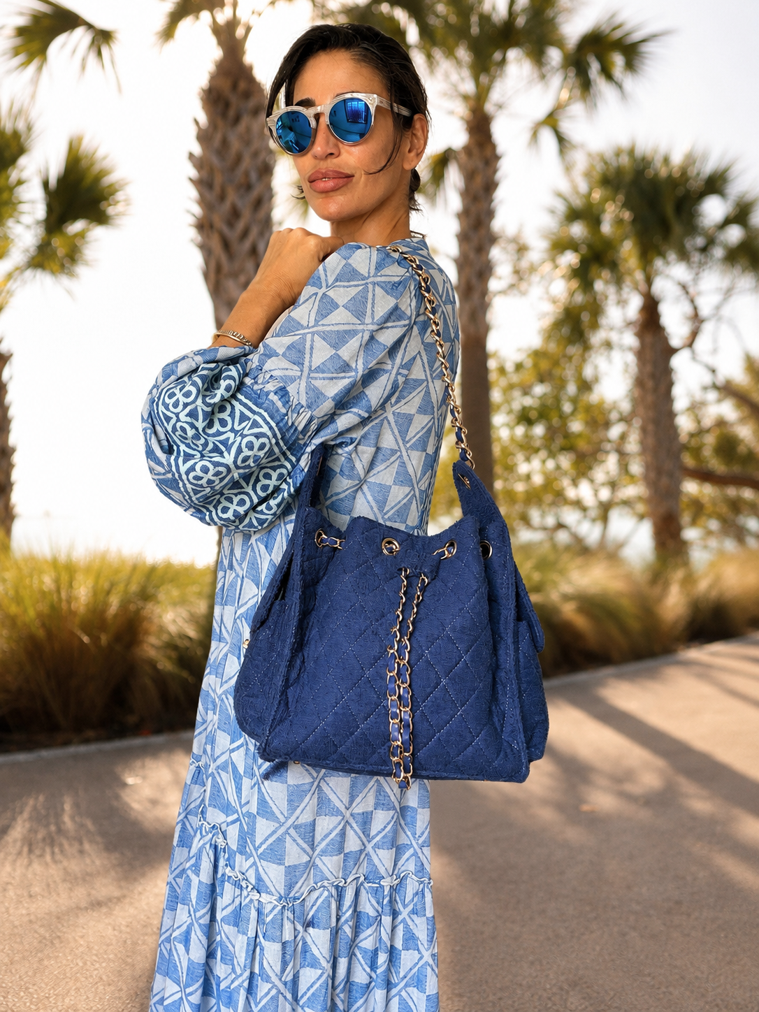 BEACH HAUS Bayshore Bucket Small in navy, compact bucket bag shown against a clean background