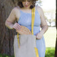Carry Courage RULE BREAKER cream zippered pouch flat lay