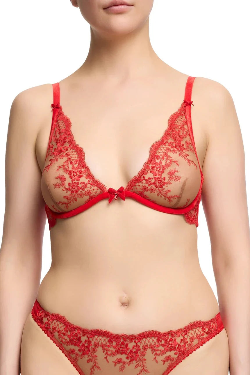 Red Dita Von Teese Lavinia Flame plunge bra with intricate lace details and supportive fit, shown on a mannequin.