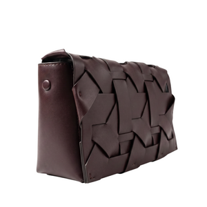 Woven Zenobia clutch handbag by thebagicon, featuring intricate woven design and compact style for elegant accessories.