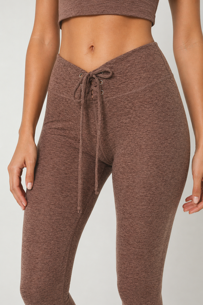 Trophy Yoga All Tied Up leggings made in USA, showing a fitted design and tied waist detail