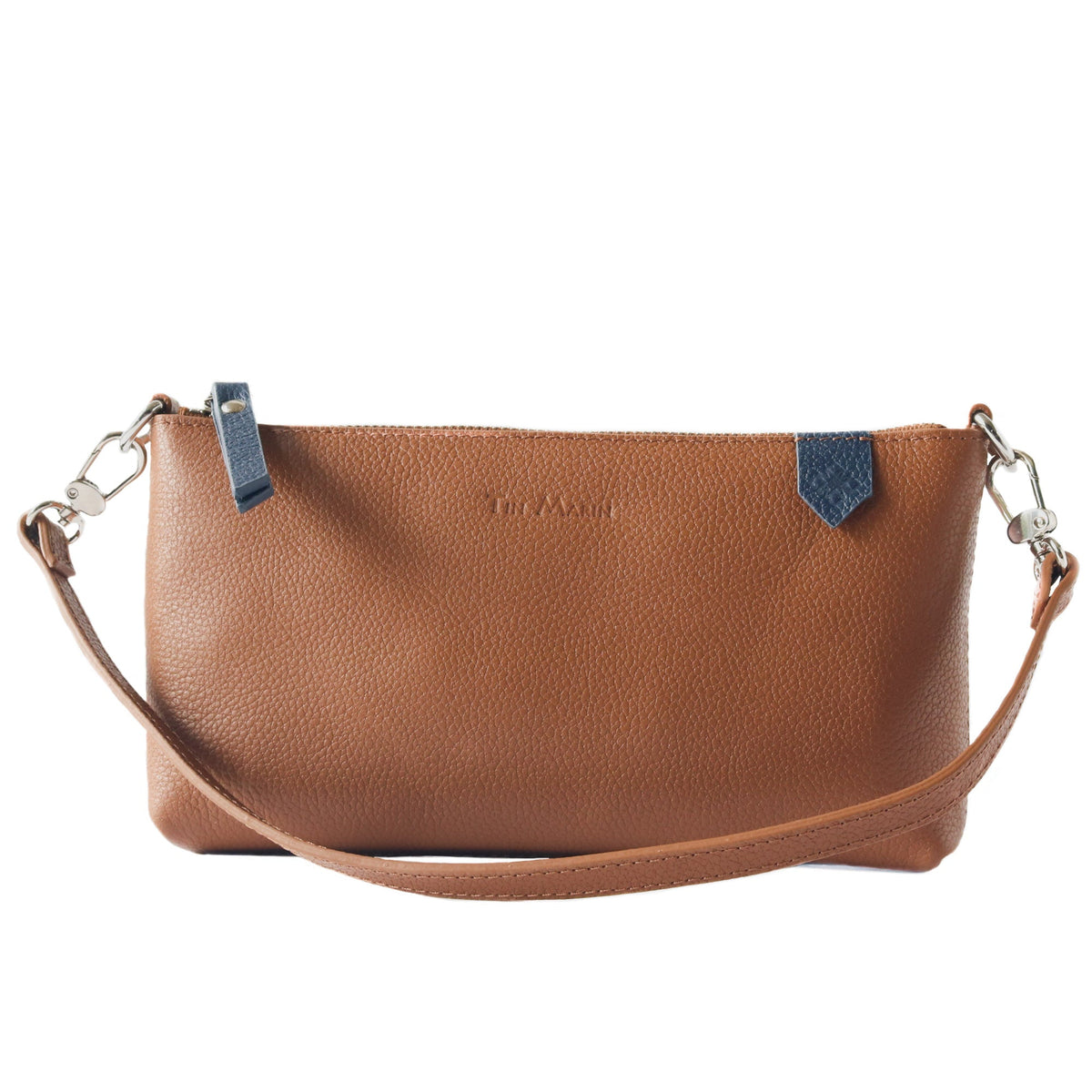 Tan leather Elia convertible shoulder bag by Tin Marin, showing its clutch, shoulder, and crossbody styles with sleek design.