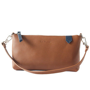 Tan leather Elia convertible shoulder bag by Tin Marin, showing its clutch, shoulder, and crossbody styles with sleek design.