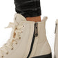 Alaska® Outerwear Company Aspen genuine shearling lined winter boots with fur lining and sturdy sole, suitable for cold weather.